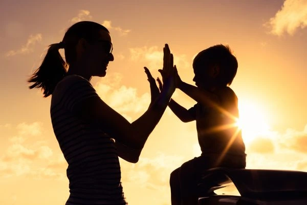 Image of happy mother and child after resolving child arrangements Blyth